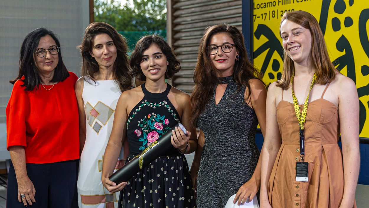 Camila Kater with her producers Chelo Loureiro and Lívia Perez, and two representatives of the Youth Jury, Locarno 2019