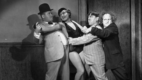 The Three Stooges Disorder in the Court_02 © 1936, renewed 1981 Columbia Pictures Industries, Inc. All Rights Reserved.jpg